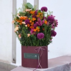 MF0928 - Фирменная овальная коробка Оранжевый и пурпурный фото №3 - moscowflorist.ru